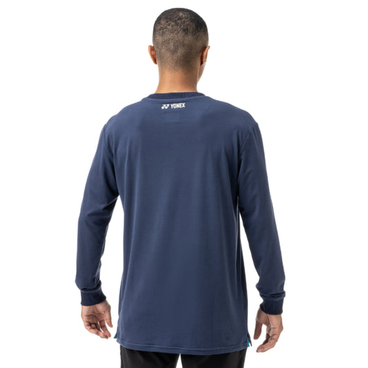 Man wearing a navy long-sleeve shirt with Yonex logo on the back, on a white background