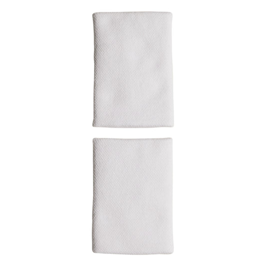 Two white Adidas wristbands with black Adidas logos on a white background