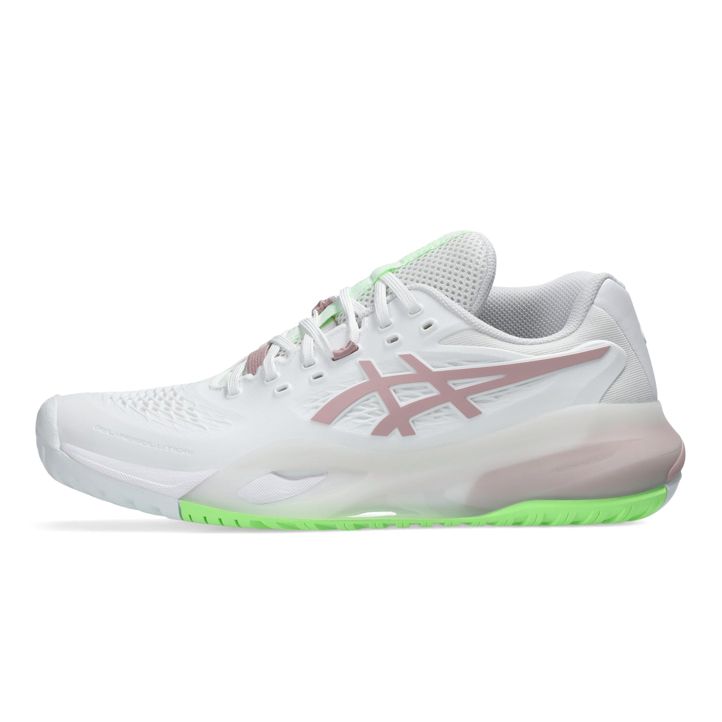 White tennis shoe with pink logo and green sole on a white background