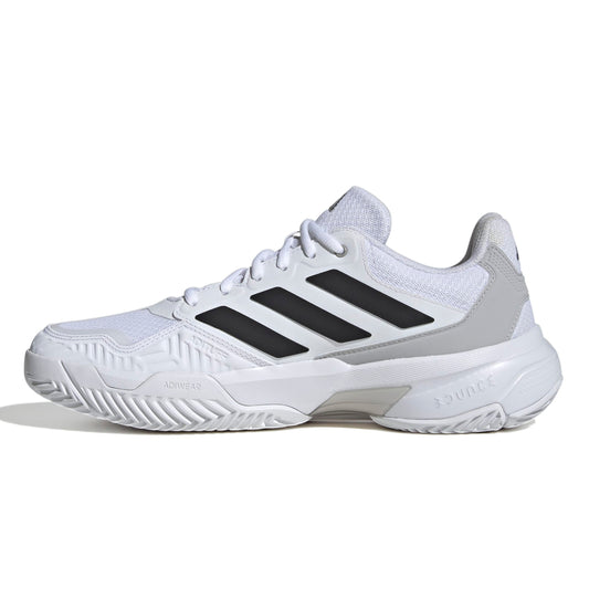 White Adidas tennis shoe with black stripes on a white background