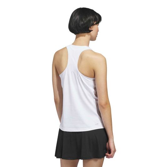 Woman wearing a white sleeveless adidas top with a logo on a white background