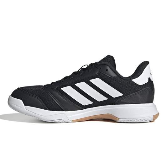 Black and white squash shoe with three white stripes on a white background