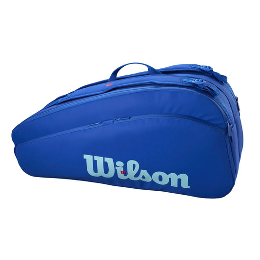 Blue Wilson tennis bag on a white background