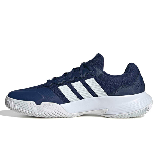 Navy adidas tennis shoe with white stripes on a white background