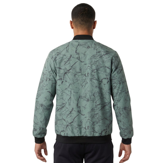 Person wearing a green jacket on a white background