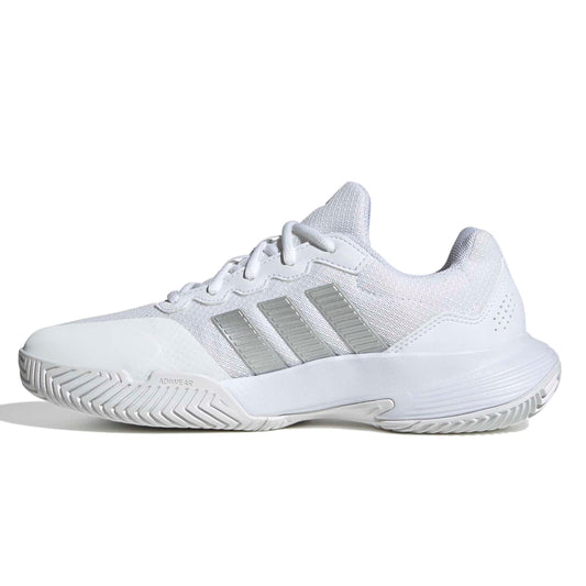 White Adidas tennis shoe on a white background