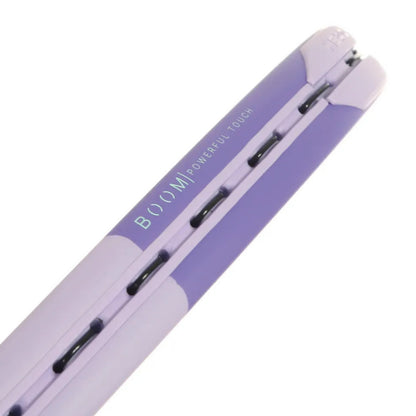 A close-up of a Head tennis racket showing its lavender purple and light purple body with the text 'BOOM POWERFUL TOUCH' printed on the side.