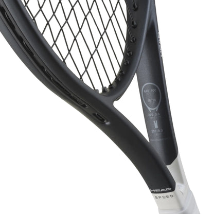 Close-up of a HEAD tennis racket showing the black frame, strings, and part of the white grip against a white background.