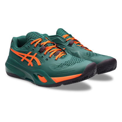 A dark green padel shoes with bright orange accents, including the ASICS logo and laces, shown in a side profile on a white background.