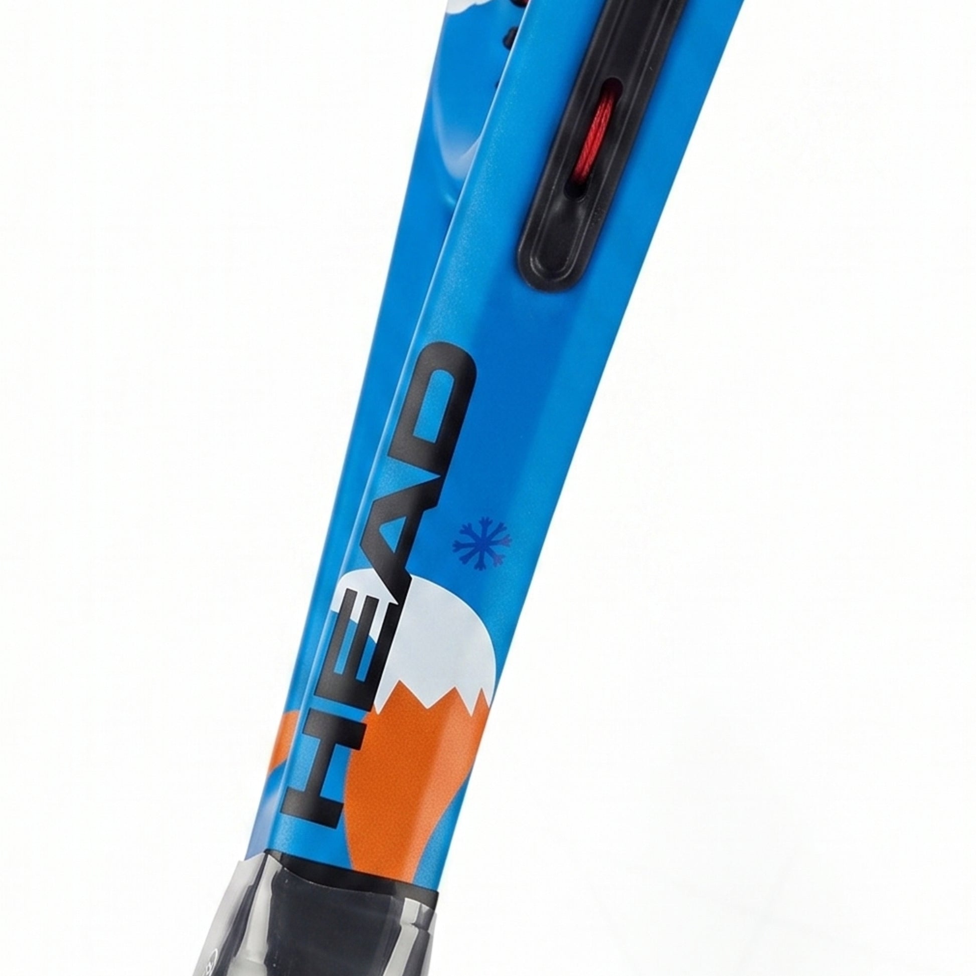 Close-up of a blue HEAD racquet shaft with black, white, and orange graphics, featuring the HEAD logo and a red switch on a white background.
