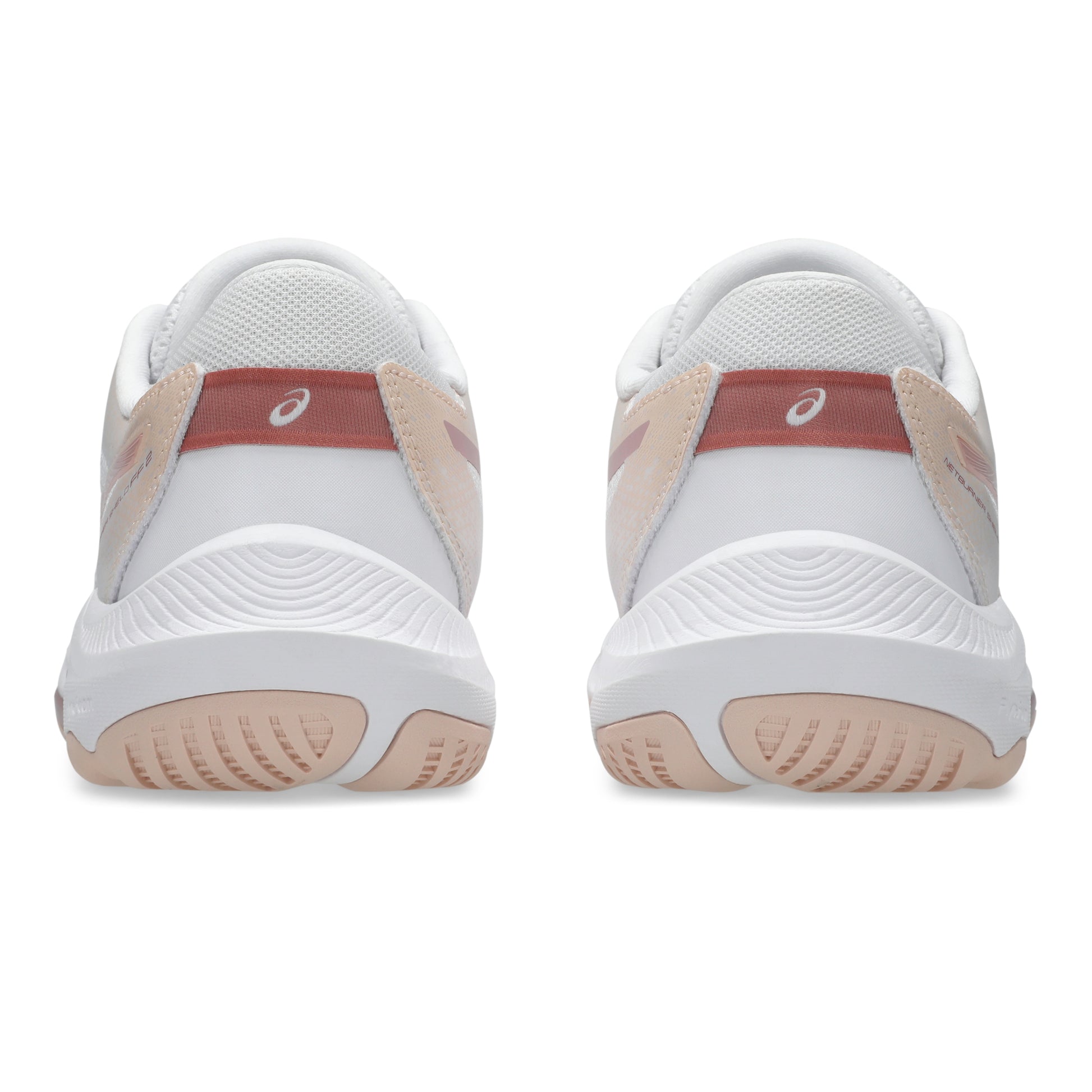 White and pink netball shoes with a red accent on a white background
