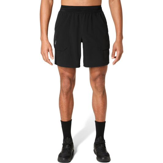 Man wearing black shorts with logo on right leg , on a white background