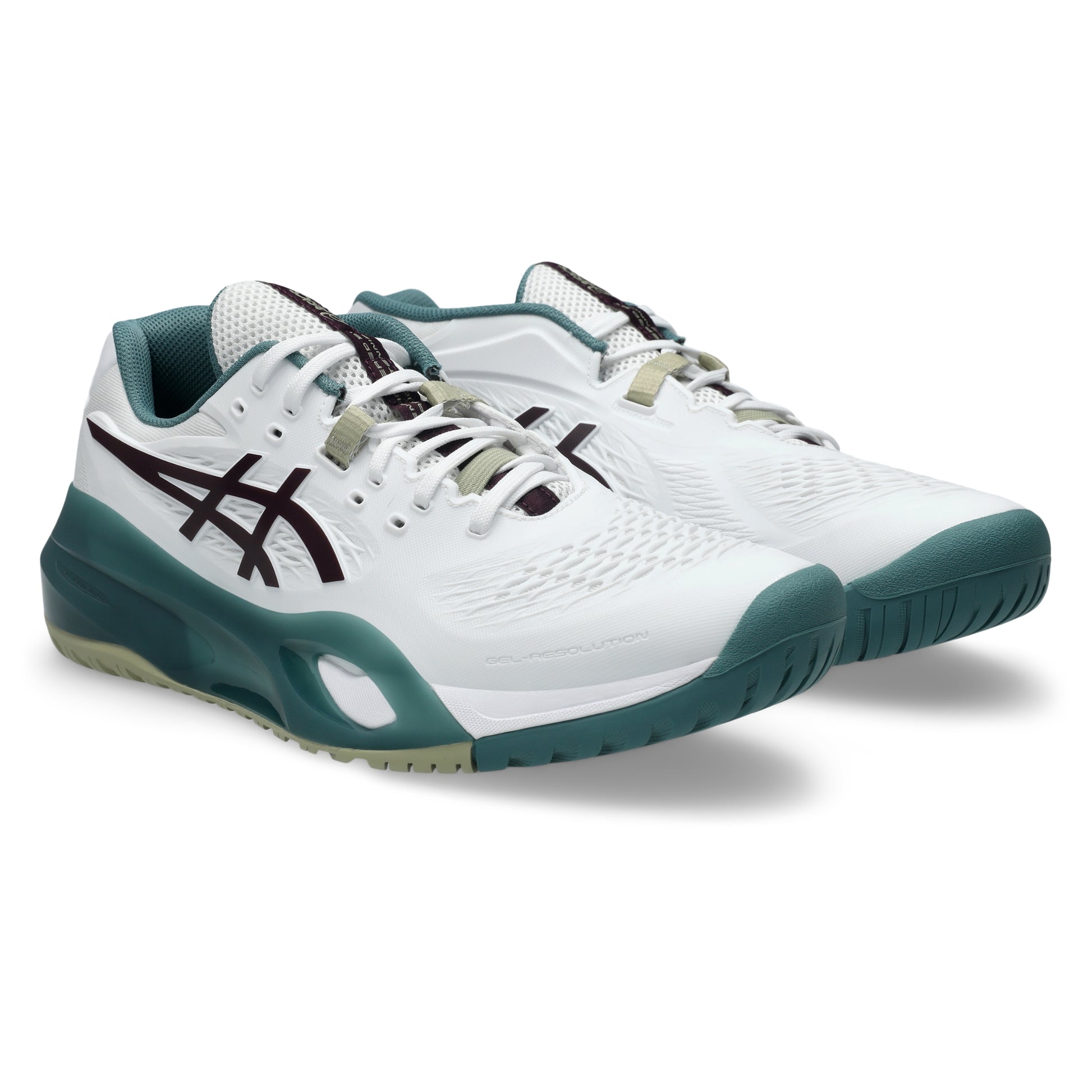A pair of Asics tennis shoes in white with dark teal and black accents, shown on a clean white background.