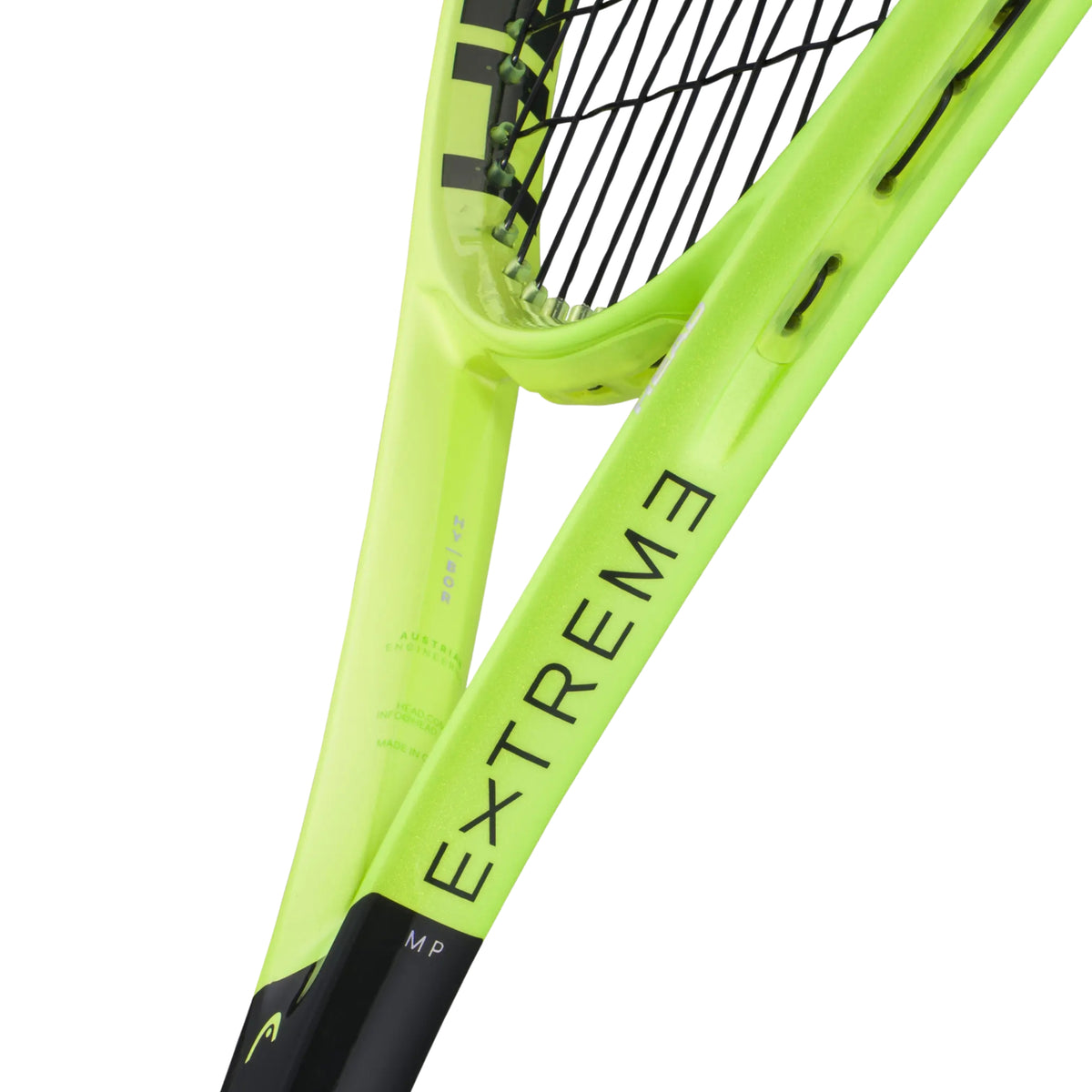 Close-up of a Head tennis racket frame in bright neon yellow-green with black stringing and black printed text reading 'EXTREME' and 'MP' on a white background.