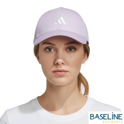 Woman wearing purple cap on a white background