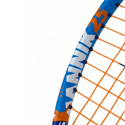 Close-up of a Head tennis racket frame and strings on a white background. The frame is blue with orange and white lettering, and the strings are bright orange.