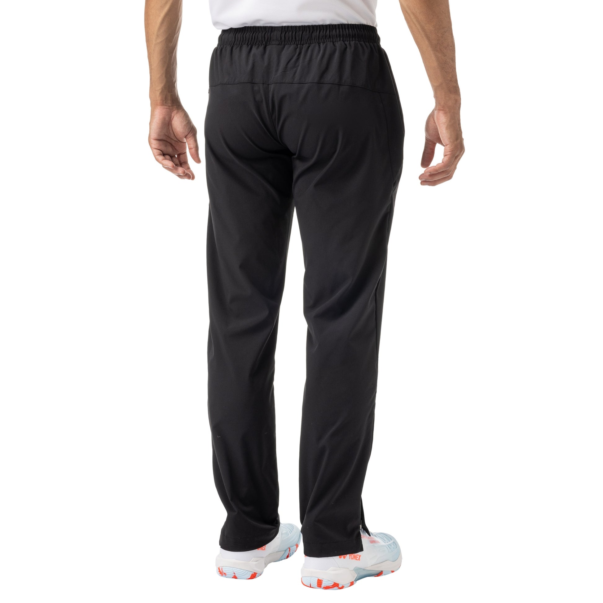 Black athletic pants with a brand logo on a white background