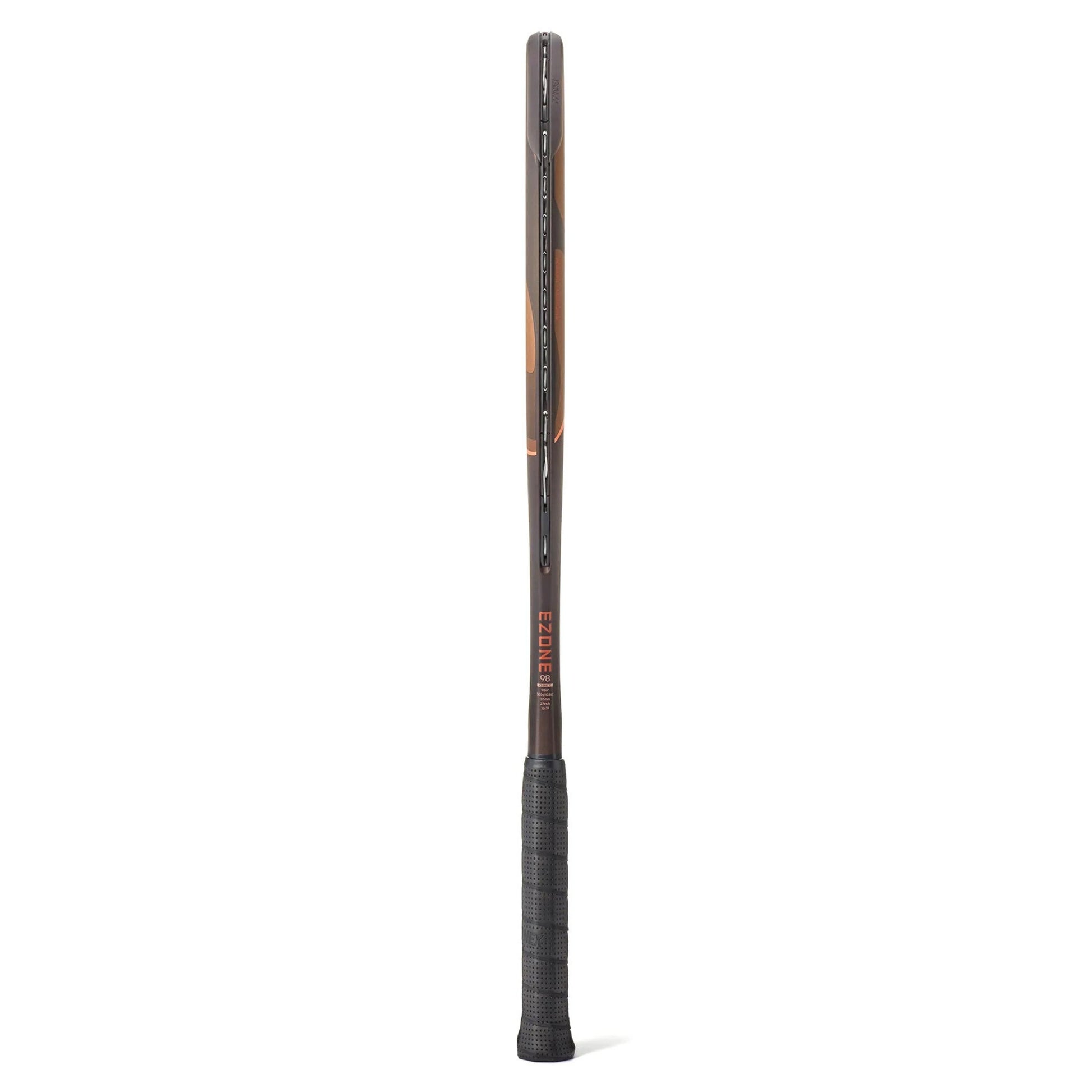 A side view of a brown and range Yonex tennis racket with a black grip on a white background