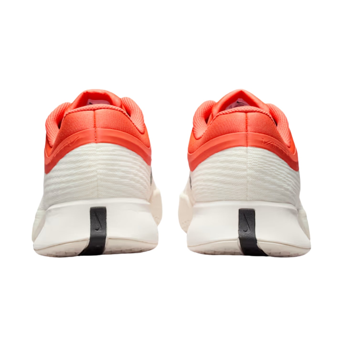 Orange, white and black Nike tennis shoes on a white background