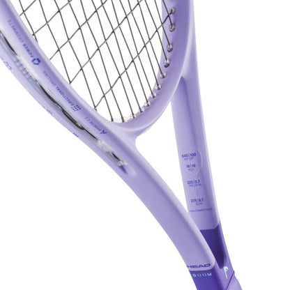 Close-up of a purple Head tennis racket with brand name on a white background