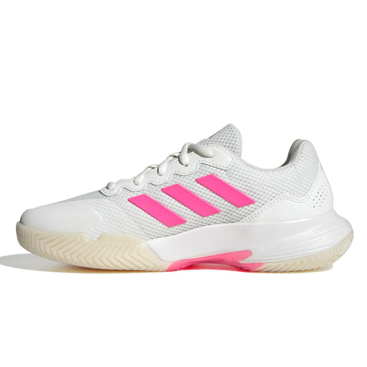 White adidas tennis shoe with pink stripes on a white background