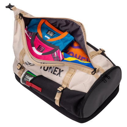 Open backpack with colorful shoes inside, featuring a visible Yonex brand logo.