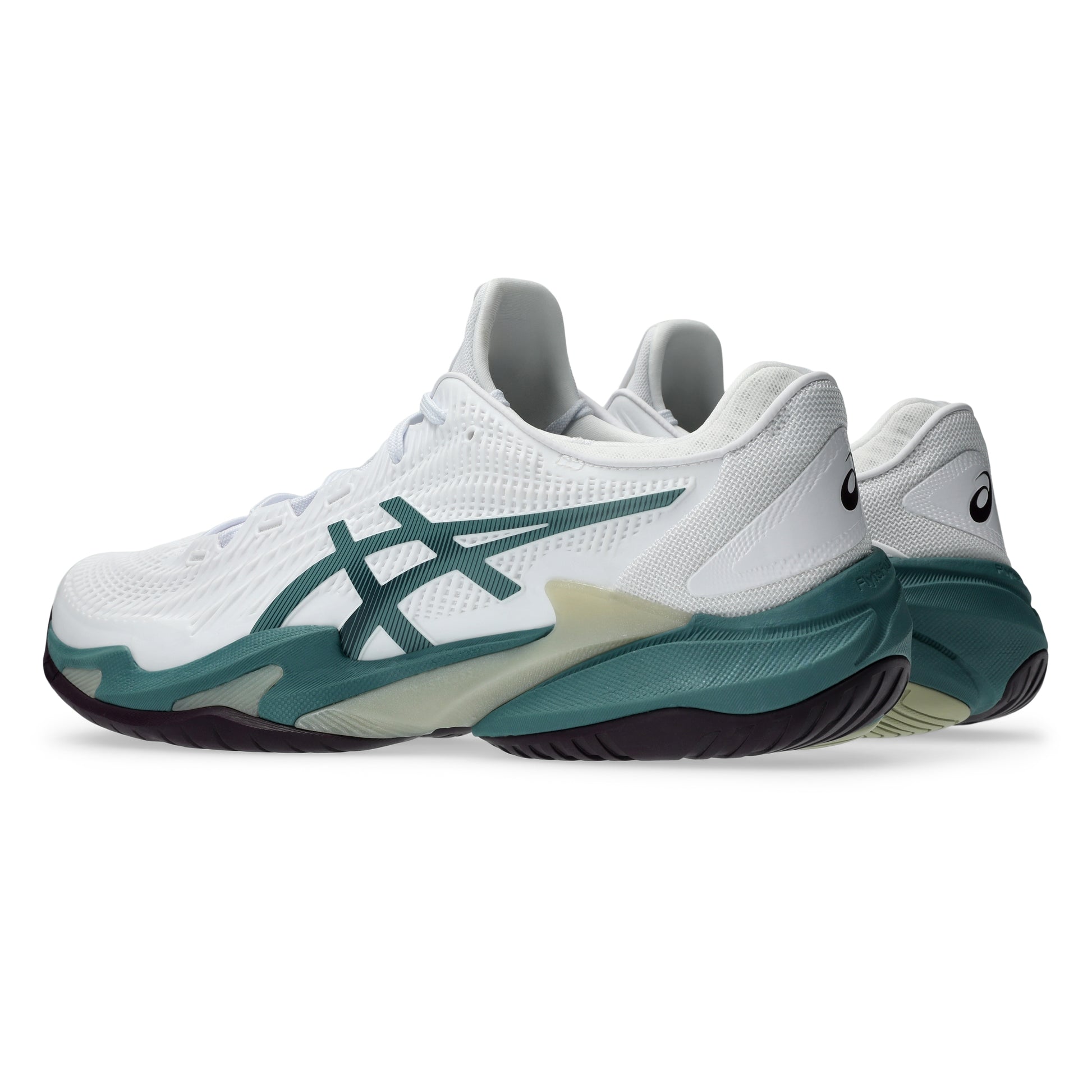 White and dark green Asics tennis shoes with a black sole on a white background