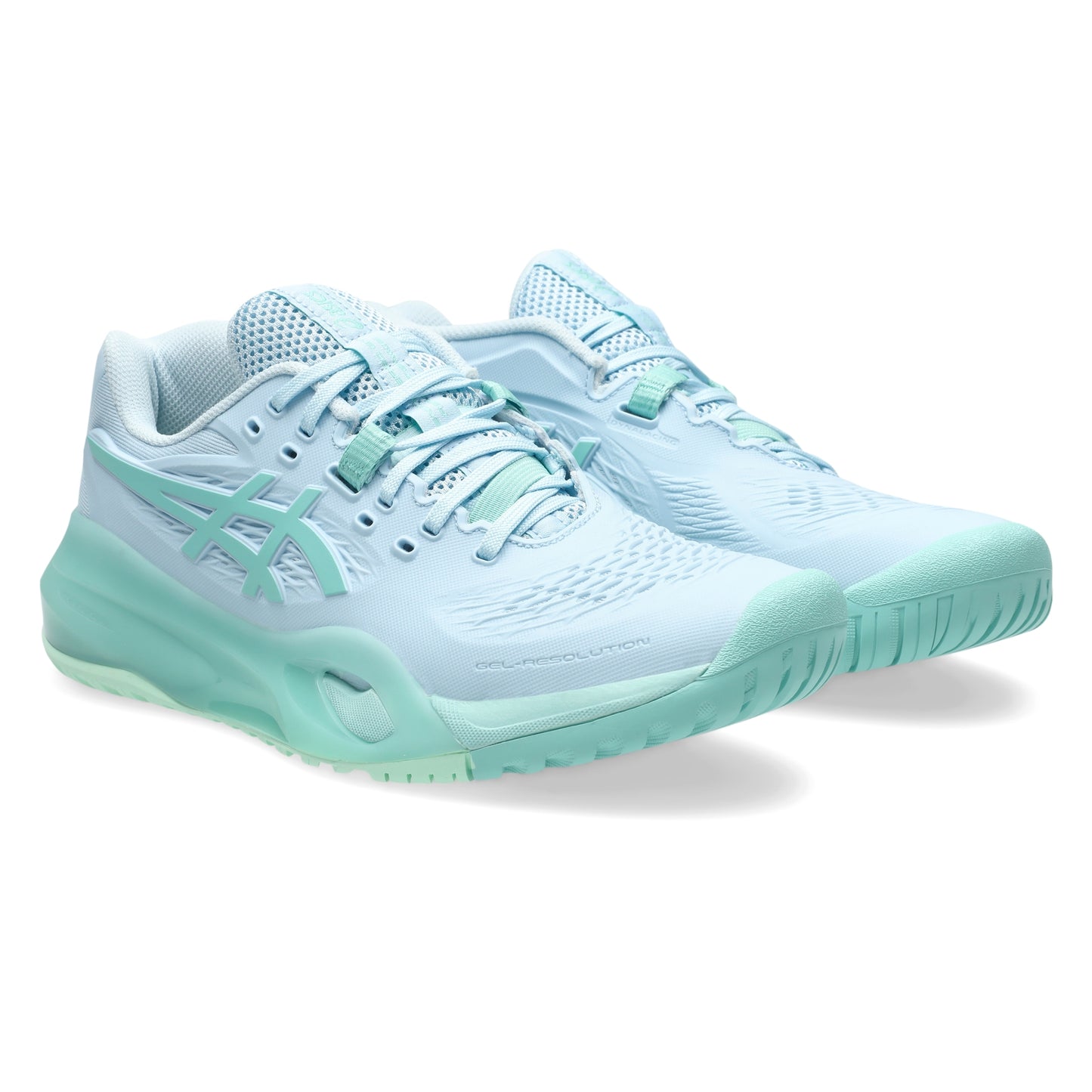 A pair of Asics tennis shoes in light blue and mint green, shown from a three-quarters angle on a white background.