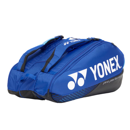 Blue Yonex tennis bag on a white background