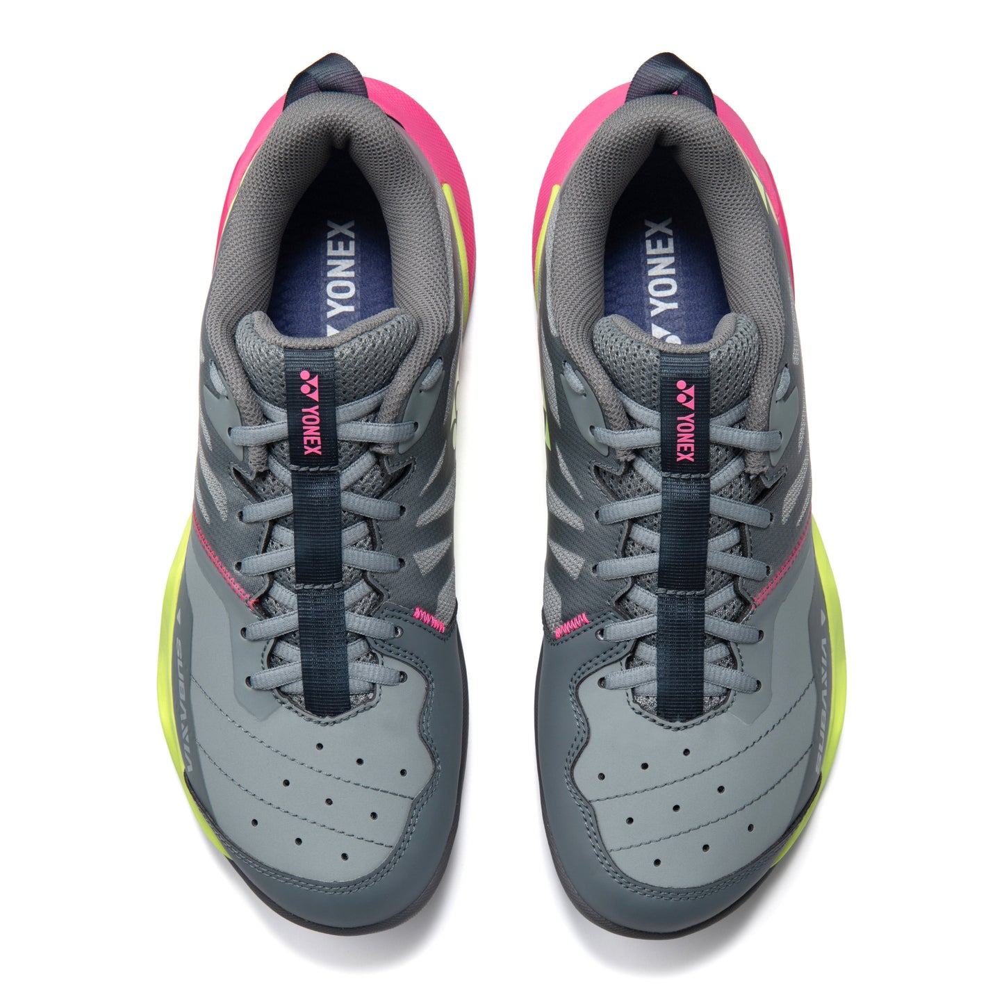 Gray Yonex squash shoes with pink and yellow accents on a white background