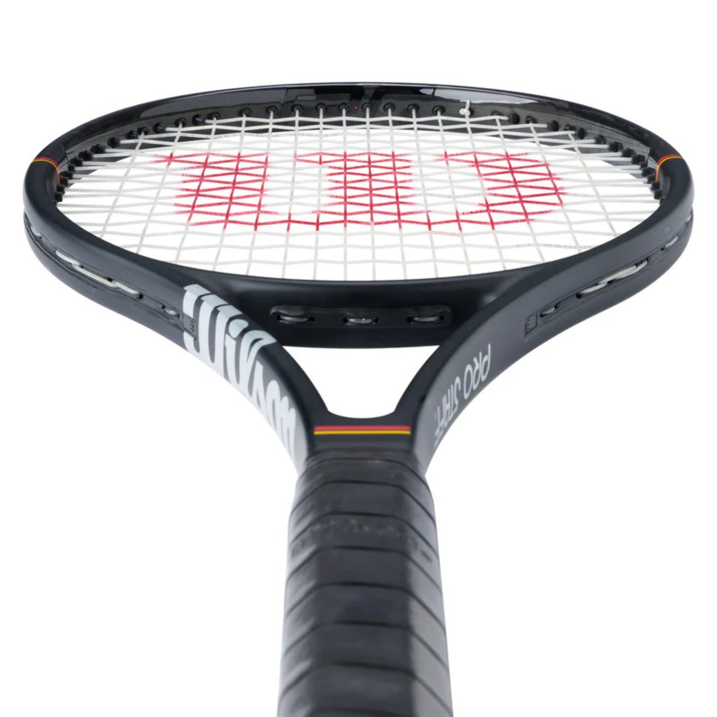 Tennis racket with black frame and red strings on a white background