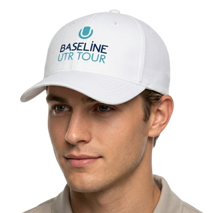 Man wearing a white Baseline UTR Tour cap on a white background
