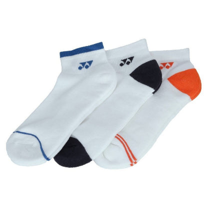 Three pairs of socks with different color accents on a white background