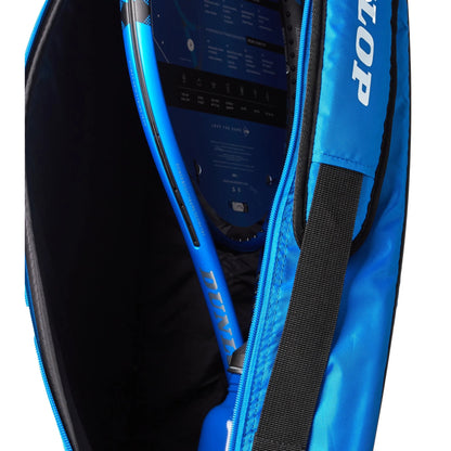 Inside view of the Dunlop blue and black 3 racket bag with Dunlop logo across the bag. 