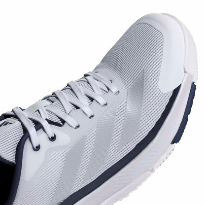 Close-up of a adidas shoe with white lases and blue accents on a white background