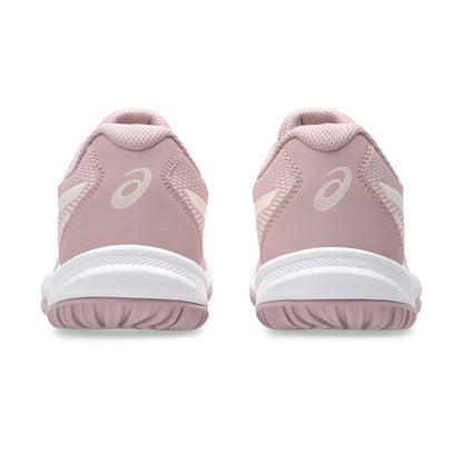 Pink athletic shoes with white soles on a white background
