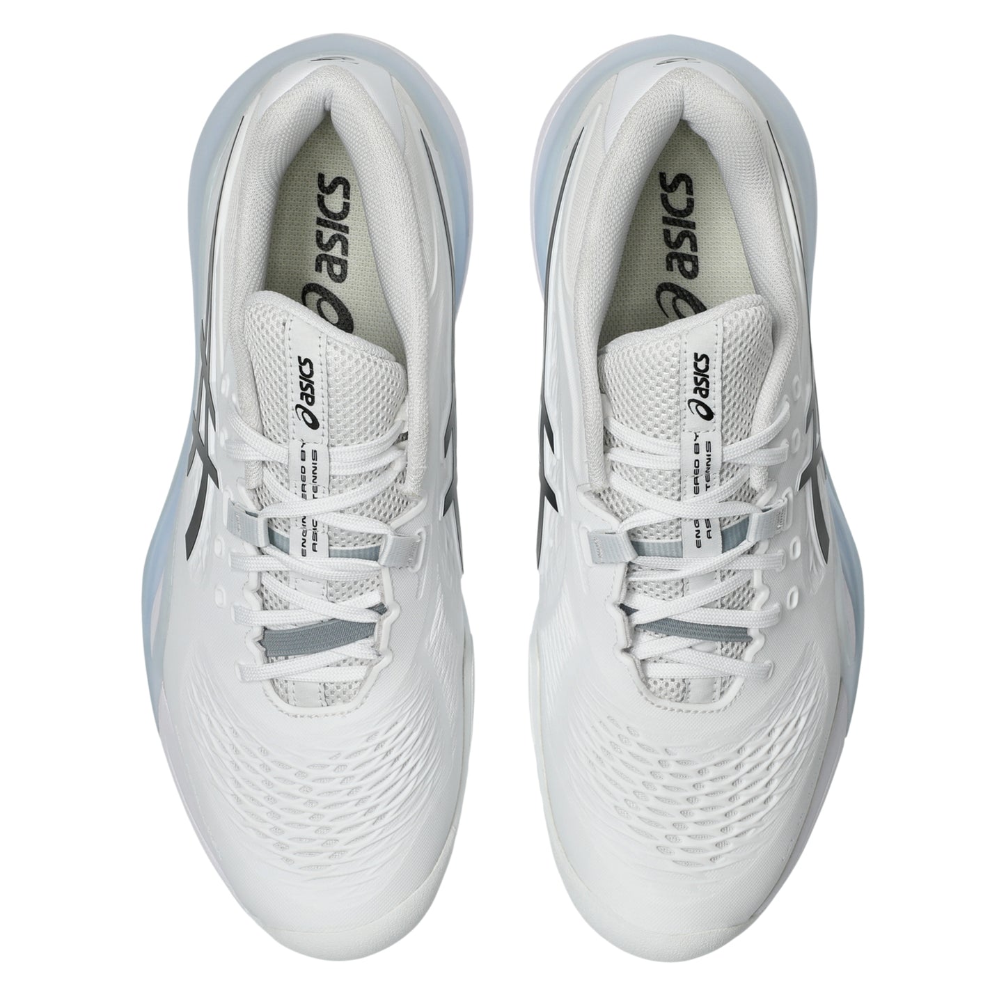 White tennis shoes with gray accents on a white background