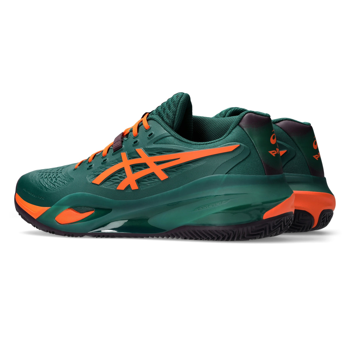 A dark green padel shoes with bright orange accents, including the ASICS logo and laces, shown in a side profile on a white background.