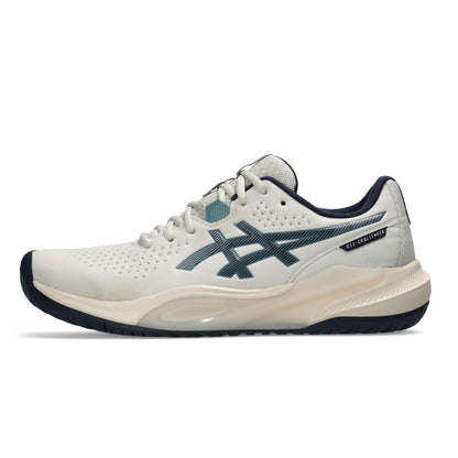 An Asics G-Challenger 15 tennis shoe in off-white with dark teal and navy accents, shown in a side profile on a white background.