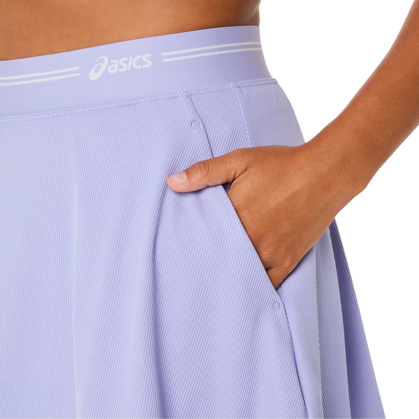 Light purple athletic skirt with Asics logo on a white background