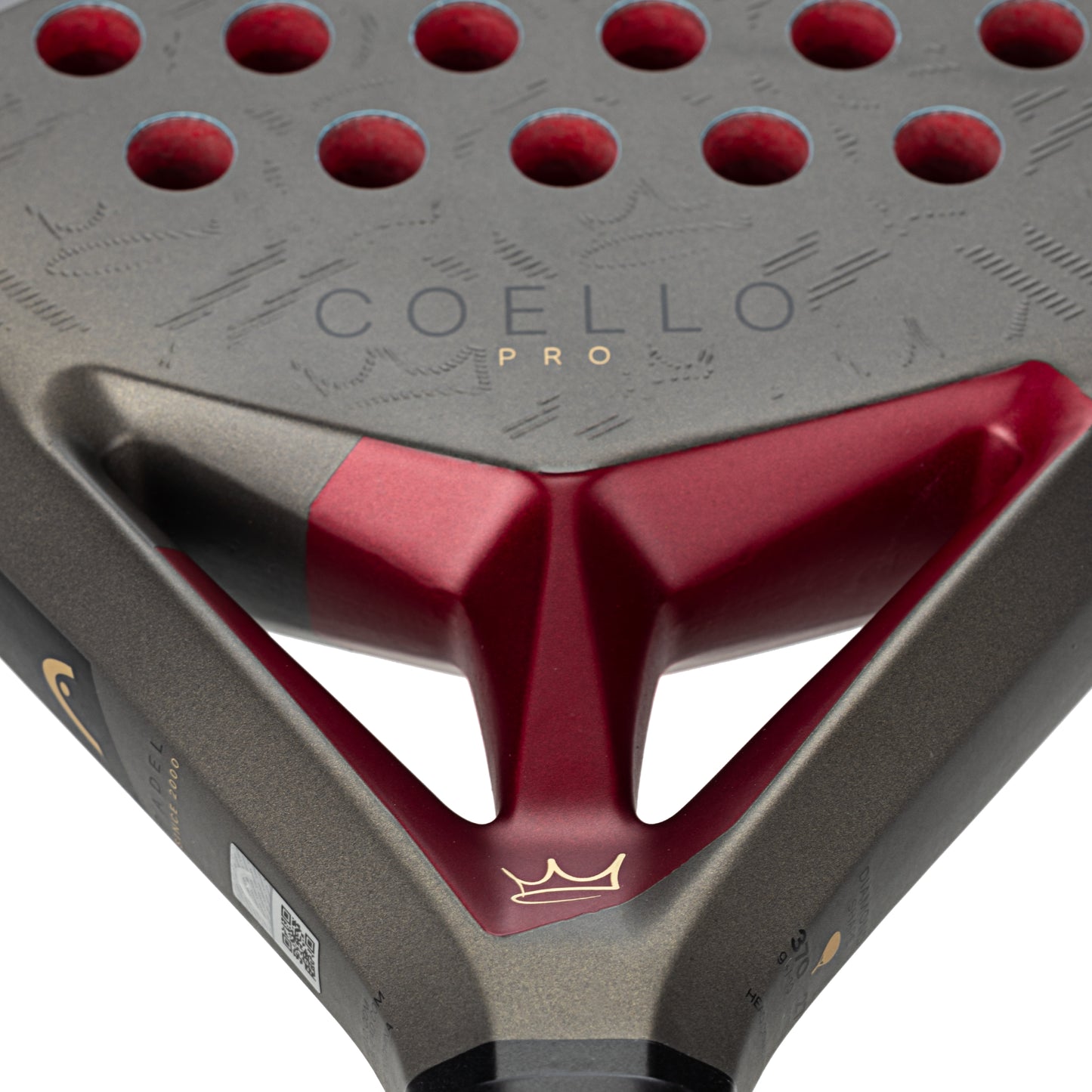 Close-up of a COELLO Pro padel racket with red and gray design on a white background