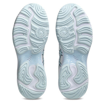 Close-up of light blue netball shoe soles on a white background