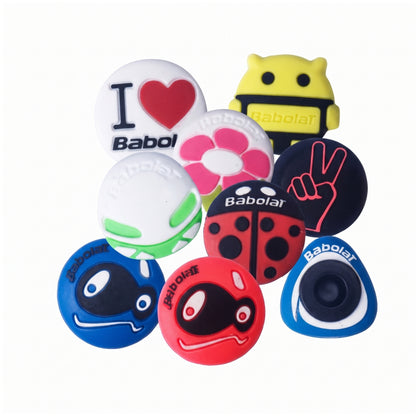 Assorted Babolat Dampeners on a white background