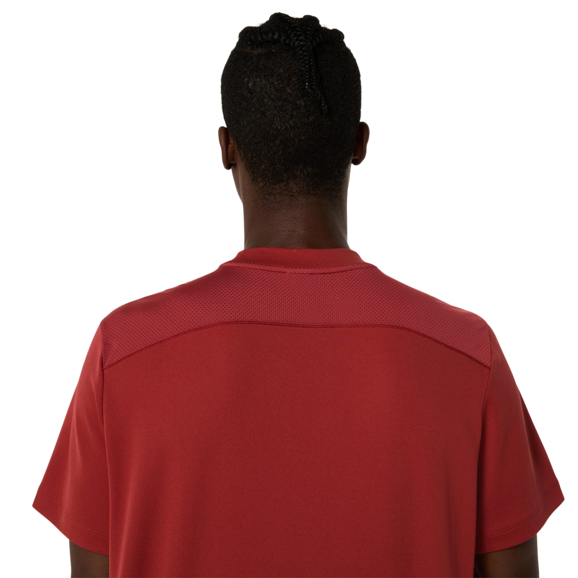 Back view of a person wearing a red shirt on a white background