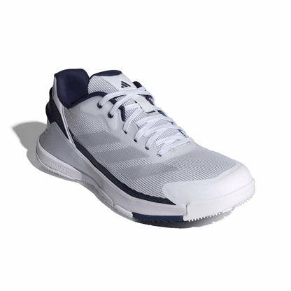 A white and navy blue Adidas padel shoe shown from the side profile on a clean white background.