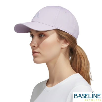 Woman wearing purple cap on a white background