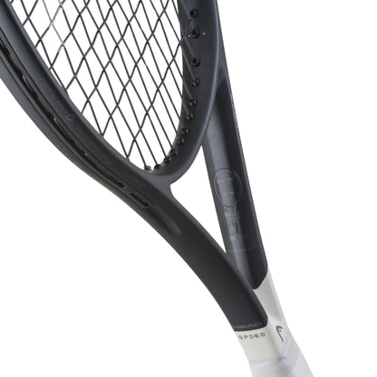 Close-up of a tennis racket with a white handle and black frame on a white background