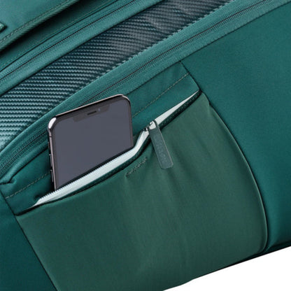 Green tennis racket bag with a phone in a pocket