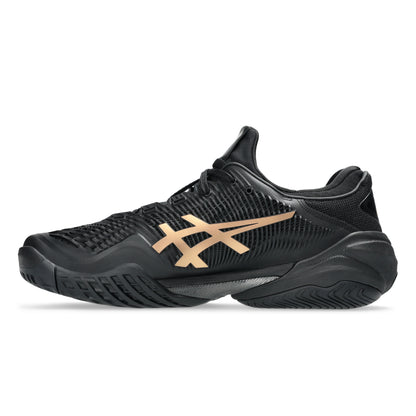 Black and beige tennis shoe on a white background