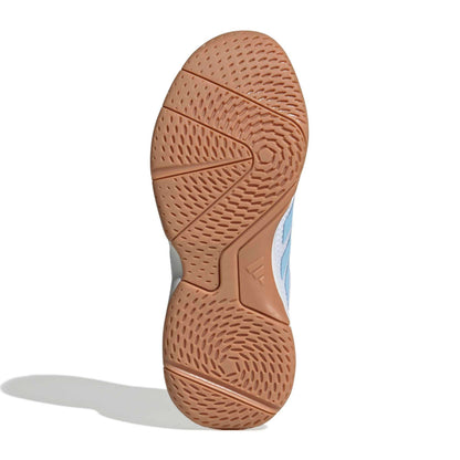 Bottom view of a adidas shoe with a tread pattern on a white background